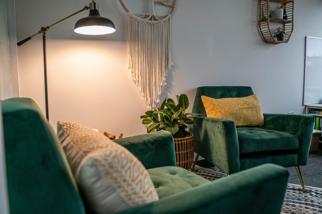 View of peaceful talking are with green chairs