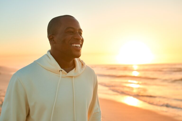 Young man watching a sunrise