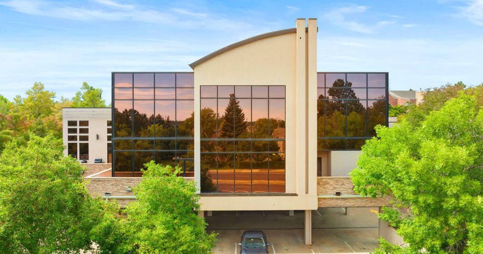 View of reflective windows on the Raleigh House building